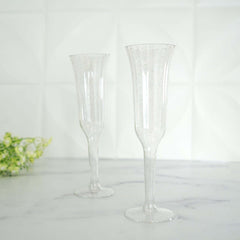 12-Pack Plastic Champagne Flutes Clear/Gold Glitter Flared Design - Lightweight Disposable Toasting Glasses 6oz