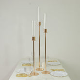 Gold Metal Taper Candle Holders with Hurricane Glass Shades, Set of 3 – Modern Minimalist Candlestick Stands – 28", 32", 36"