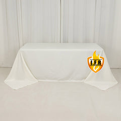 Fire Retardant Premium Polyester 90"x132" Rectangular Tablecloth Ivory - High-Performance Seamless Table Cover