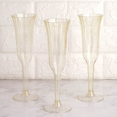 24-Pack Plastic Champagne Flutes Clear Gold Glitter Flared Design - Lightweight Disposable Toasting Glasses 6oz