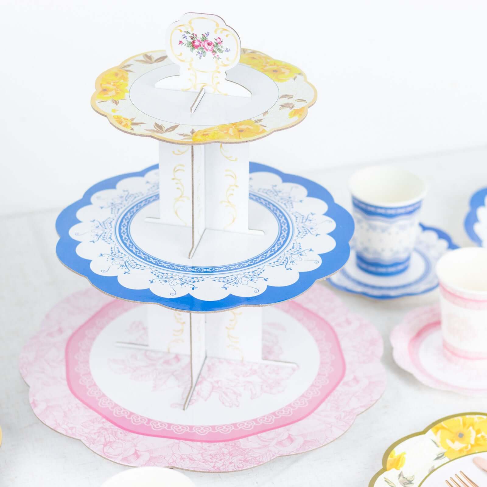 2-Pack Cardboard Round Cupcake Stand Assorted Floral Design - 3-Tier Reusable Dessert Display Pedestal With Scalloped Edges for Garden-Themed Celebrations 14"