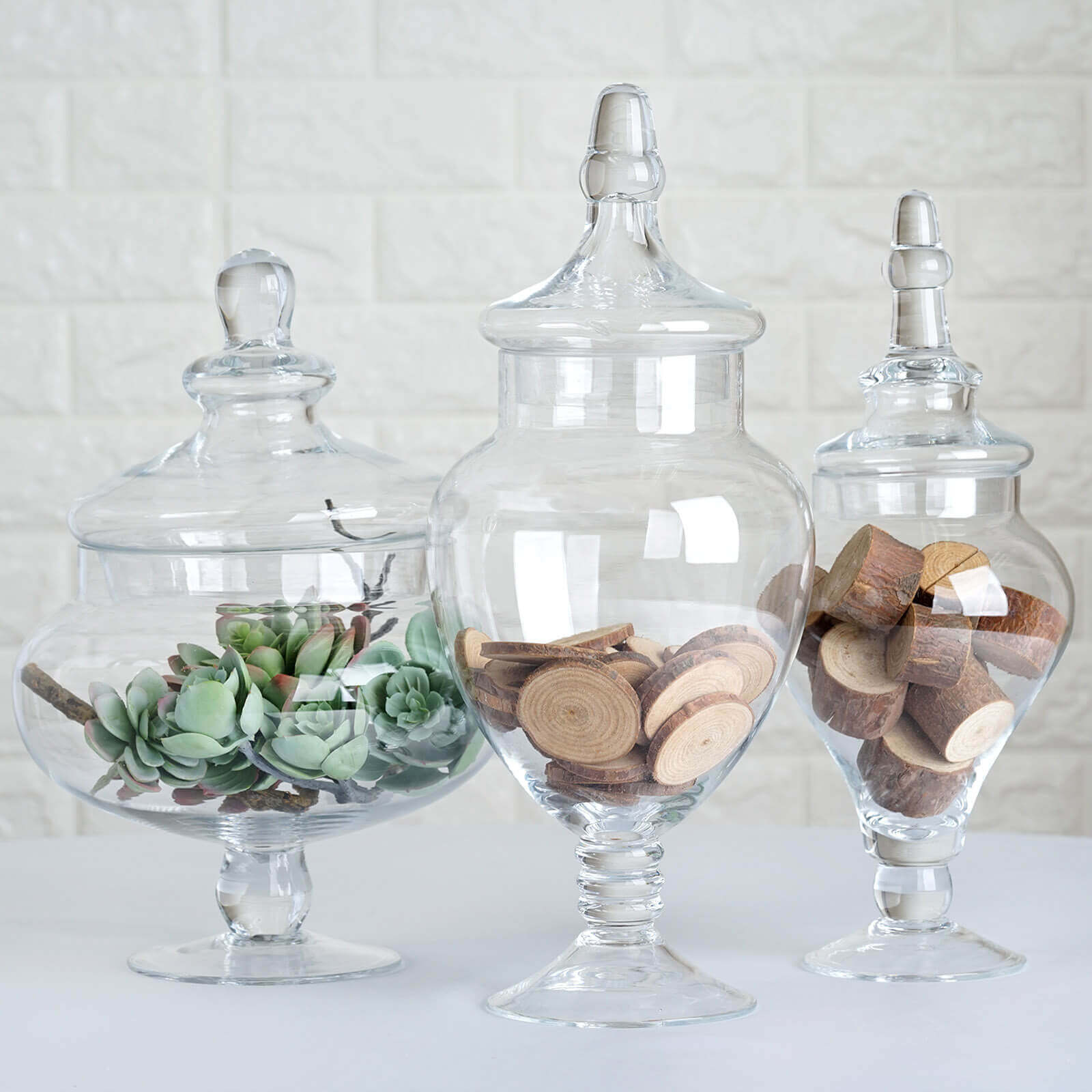 Set of 3 Glass Candy Jars Pedestal Apothecary Design Clear with Snap-On Lids - Stylish Party Favor Containers 10"/12"/14"