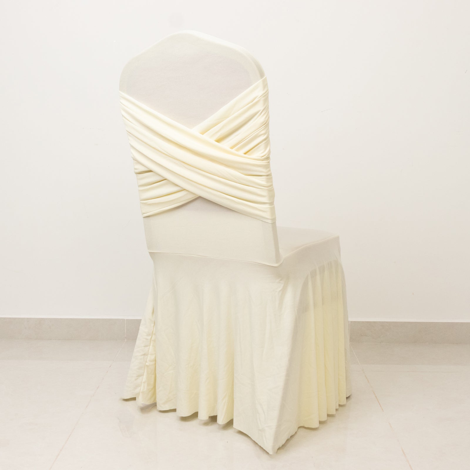 Ivory Spandex Banquet Chair Cover with Ruffle Skirt & Cross Back Sash – Stretch Slipcover for Events