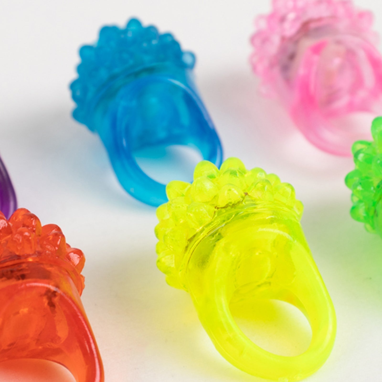 24 Pack Rubber LED Light-Up Rings, Flashing Jelly Finger Toys with 3 Flashing Modes for Party Favors, Halloween, Raves, and Concerts