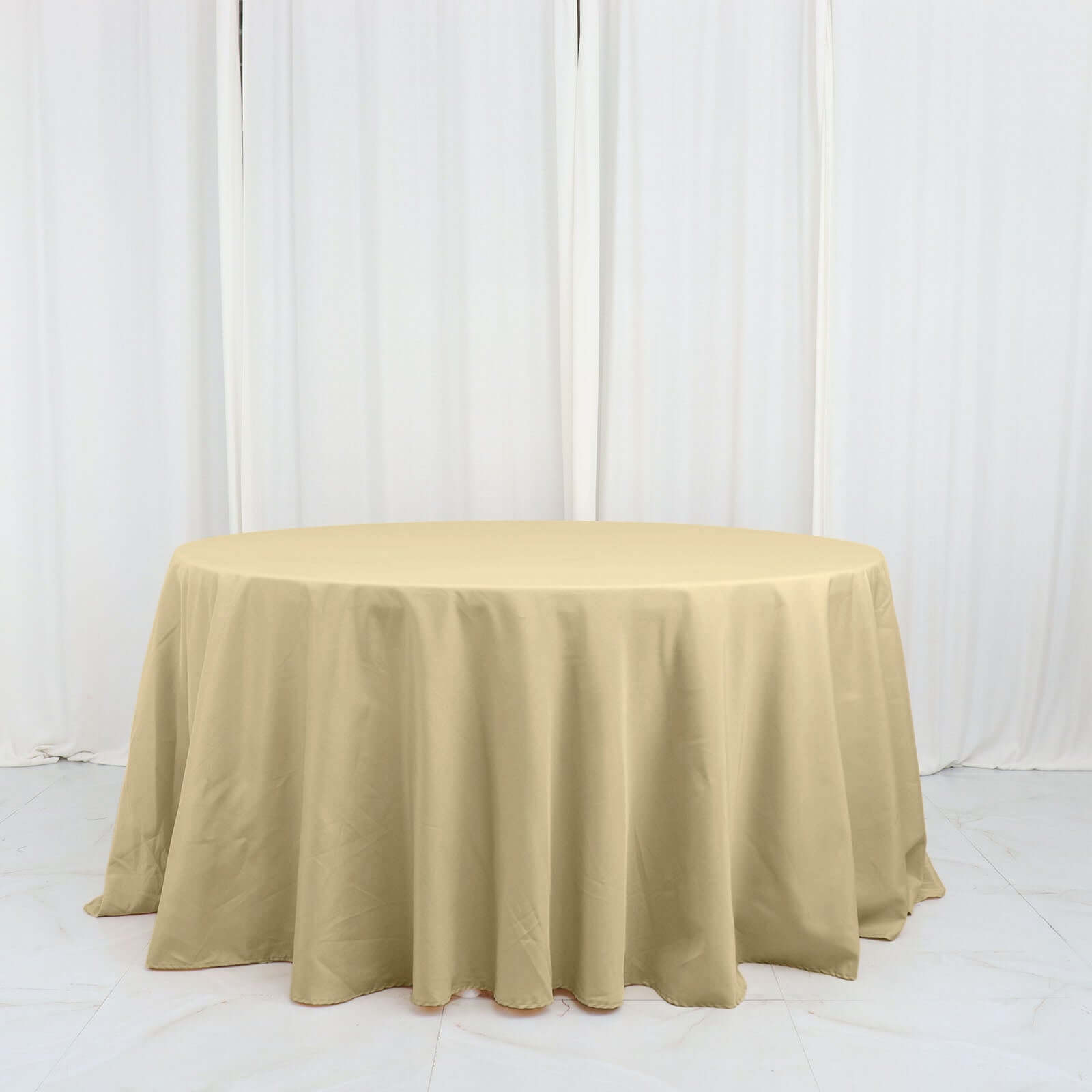 Polyester 132" Round Tablecloth Champagne - Seamless Chic Table Cover