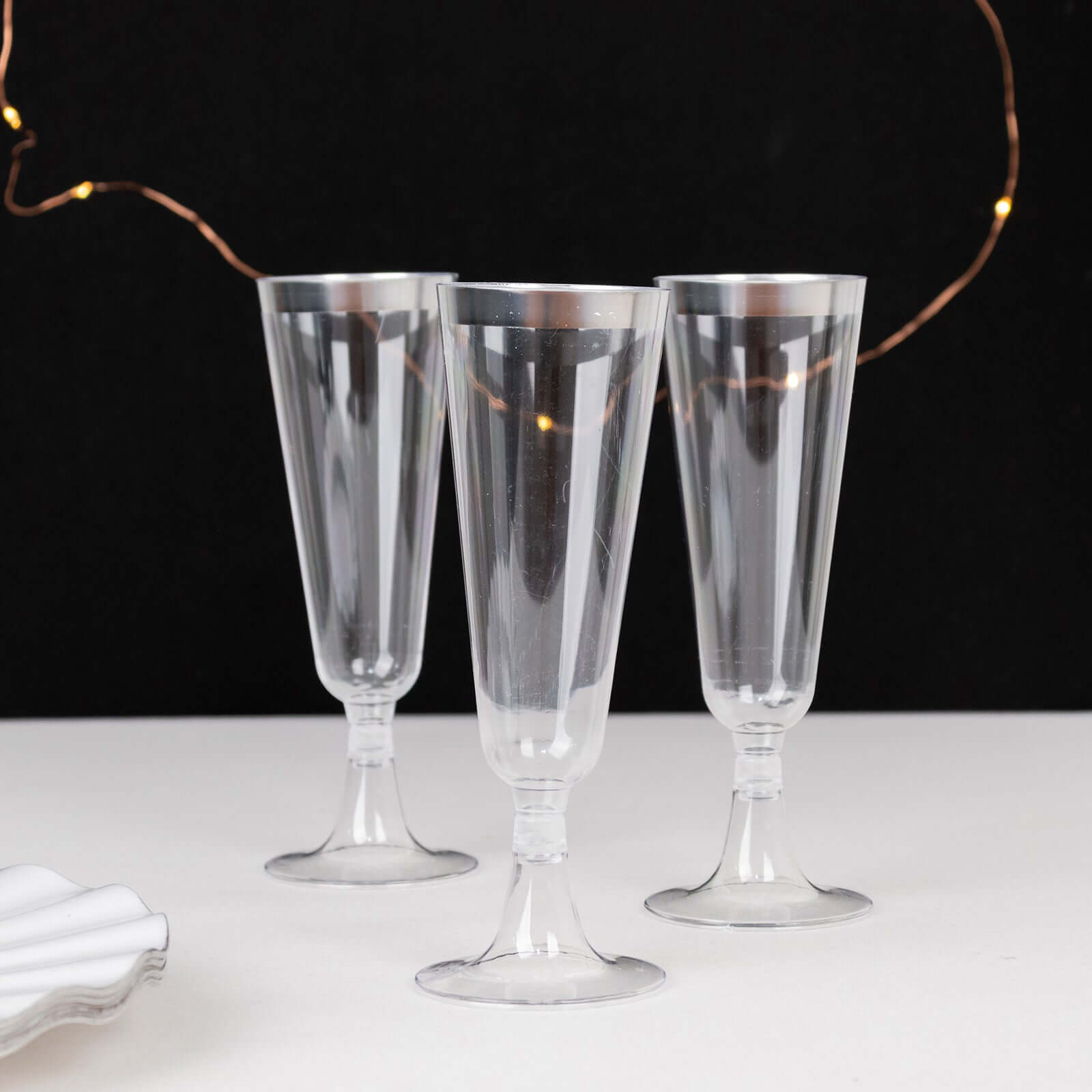 12-Pack Plastic Champagne Flutes Clear with Silver Rim - Stylish Disposable Cocktail Glasses for Parties 5oz 6"