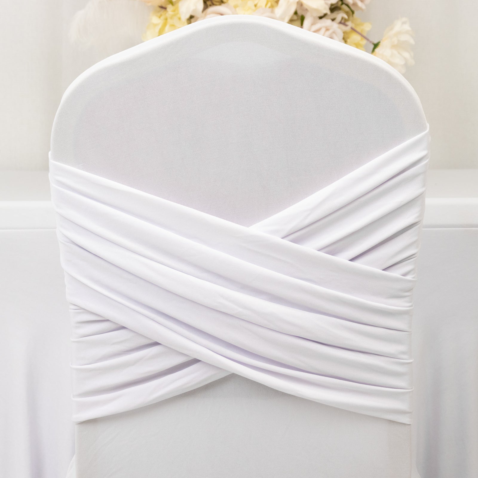 White Spandex Banquet Chair Cover with Ruffle Skirt & Cross Back Sash – Stretch Slipcover for Events
