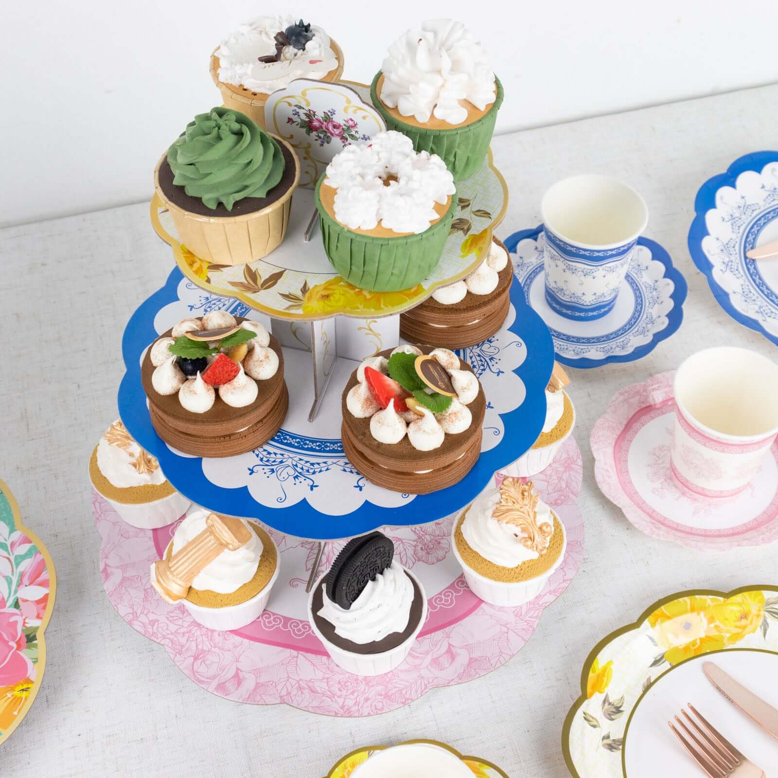 2-Pack Cardboard Round Cupcake Stand Assorted Floral Design - 3-Tier Reusable Dessert Display Pedestal With Scalloped Edges for Garden-Themed Celebrations 14"