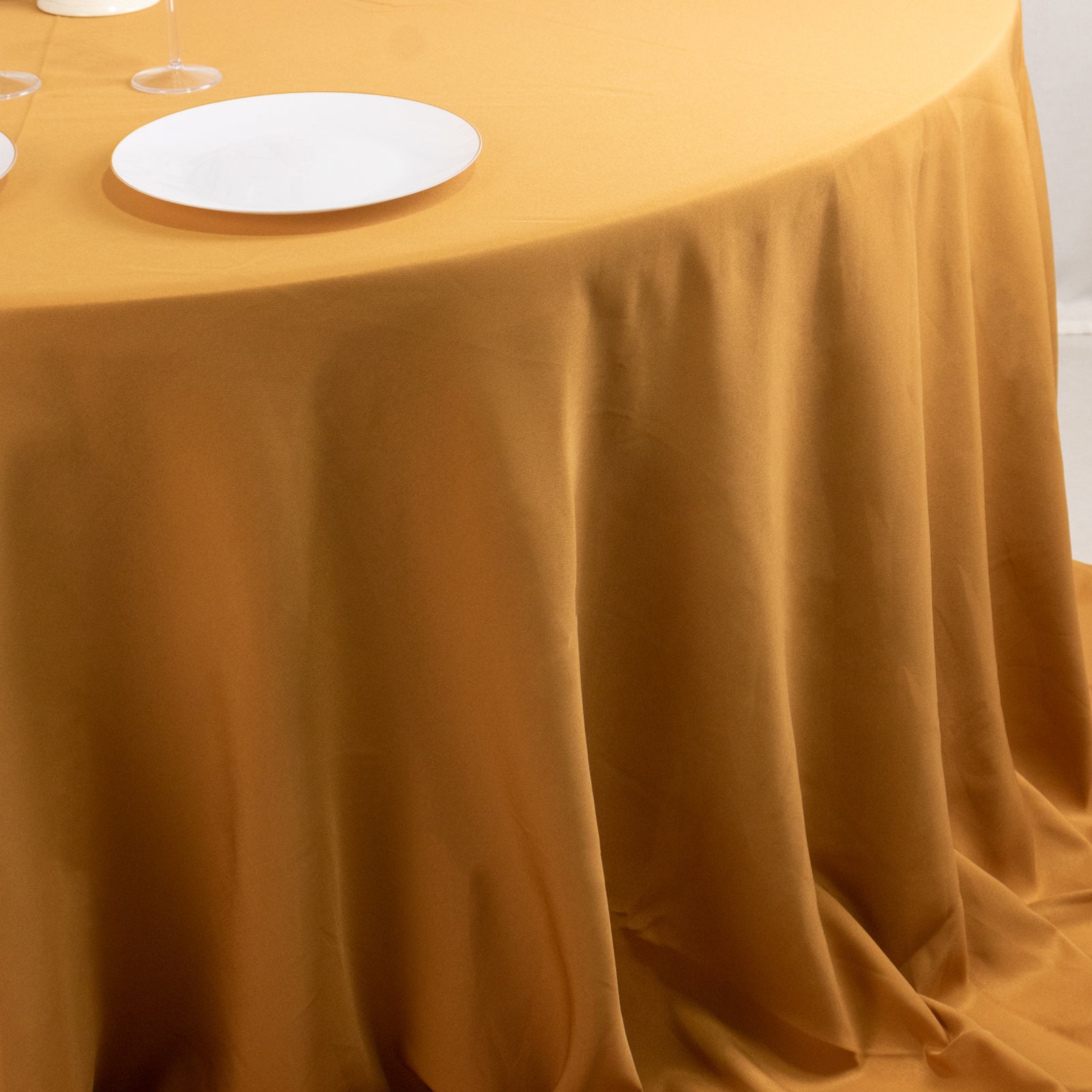 Premium Polyester 132" Round Tablecloth Gold - Seamless 220GSM Wrinkle-Resistant Design for Upscale Occasions