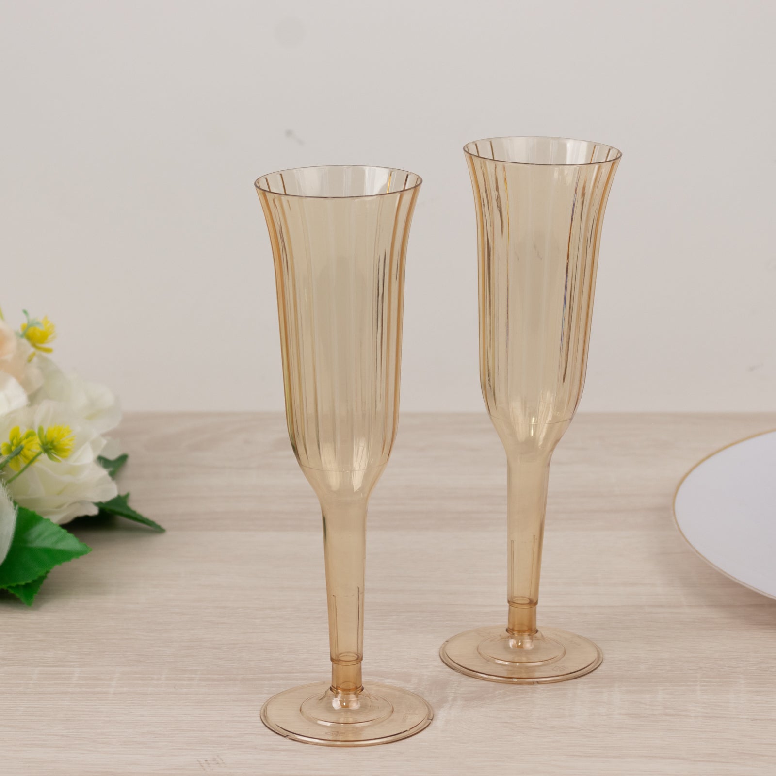 12-Pack Plastic Champagne Flutes Transparent Amber Gold Flared Design - Lightweight Disposable Toasting Glasses 6oz