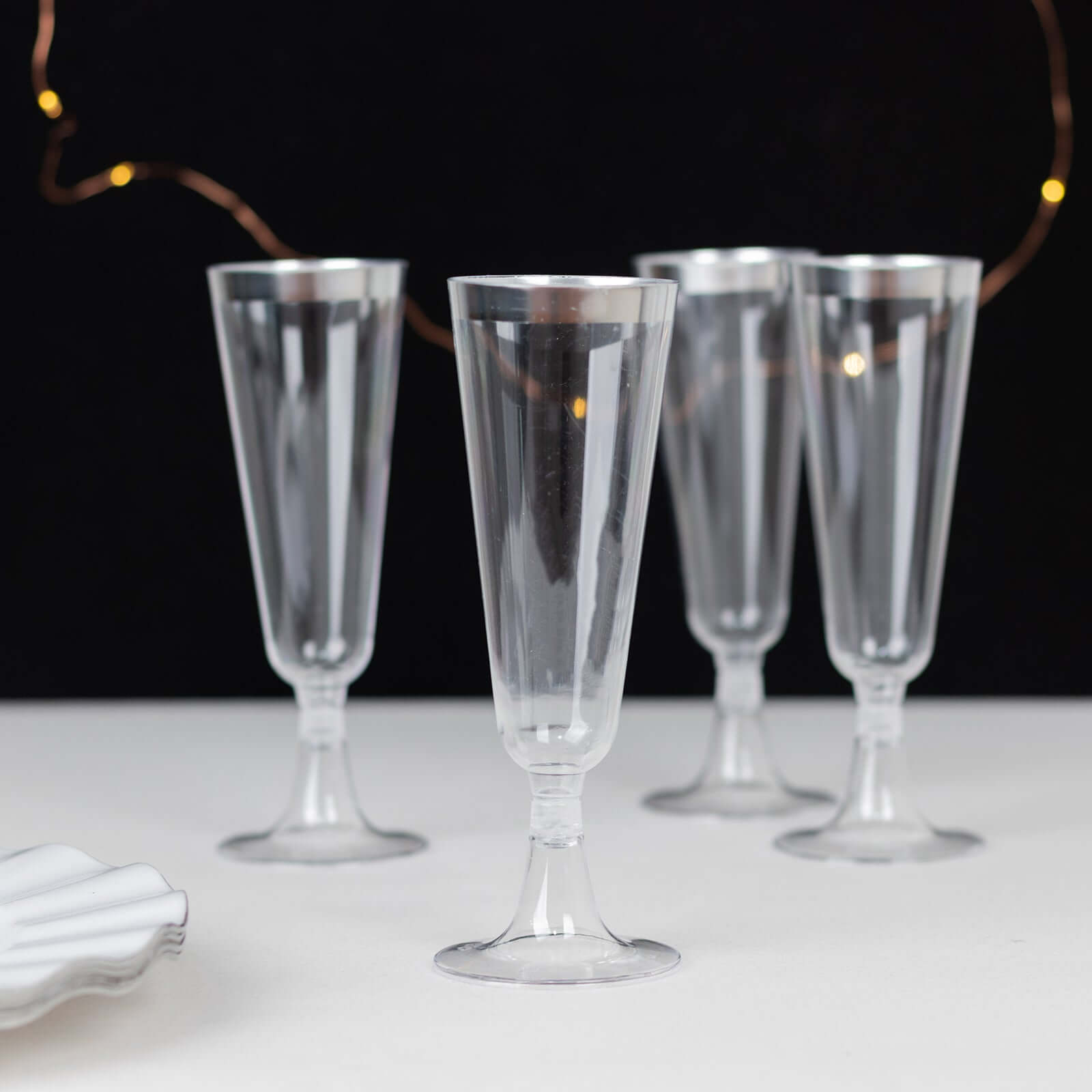 12-Pack Plastic Champagne Flutes Clear with Silver Rim - Stylish Disposable Cocktail Glasses for Parties 5oz 6"