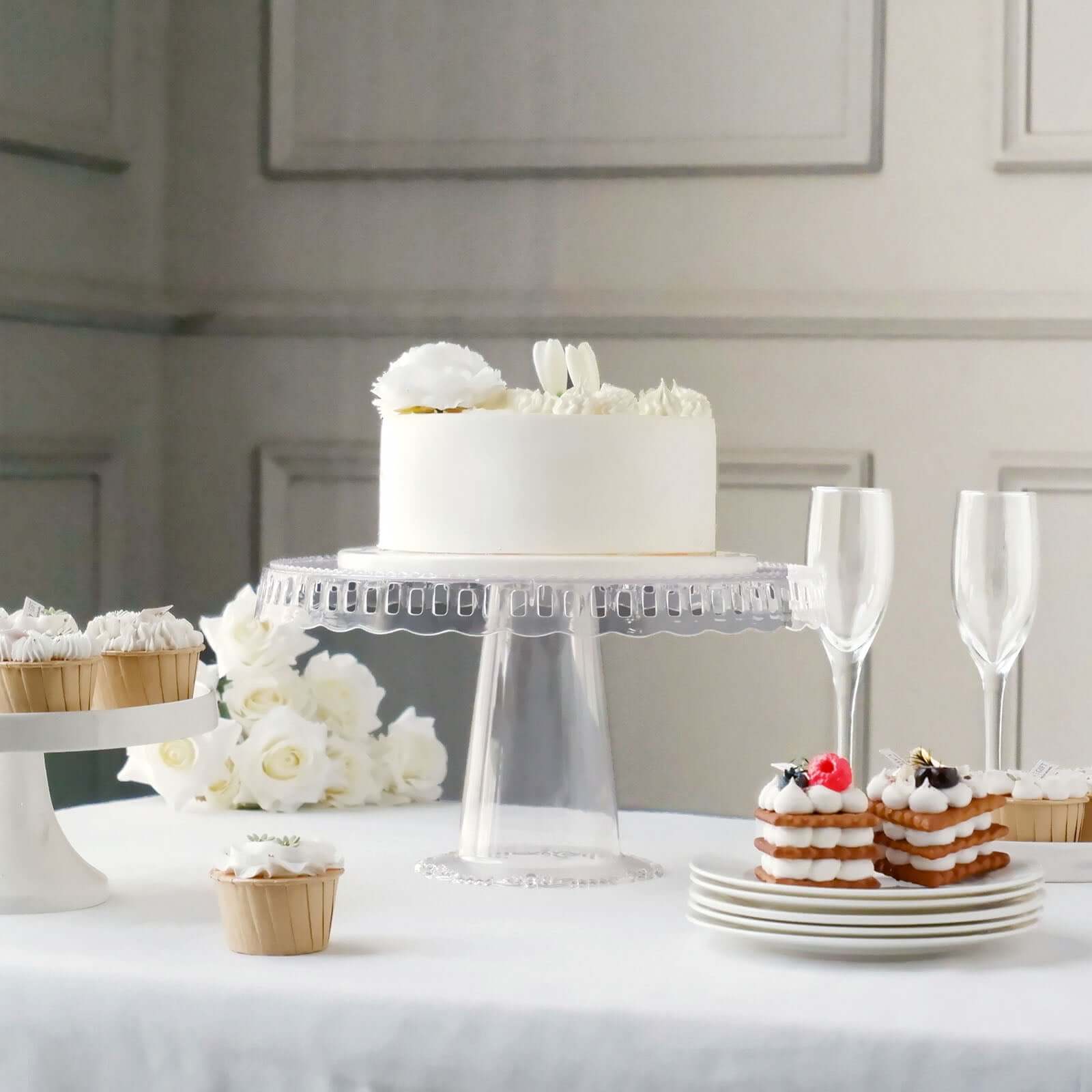 4-Pack Plastic Round Pedestal Cake Stands Clear - Reusable Cupcake Pastry Display Risers with Hollow Ribbon Trim Edges for Stylish Dessert Presentation 13"