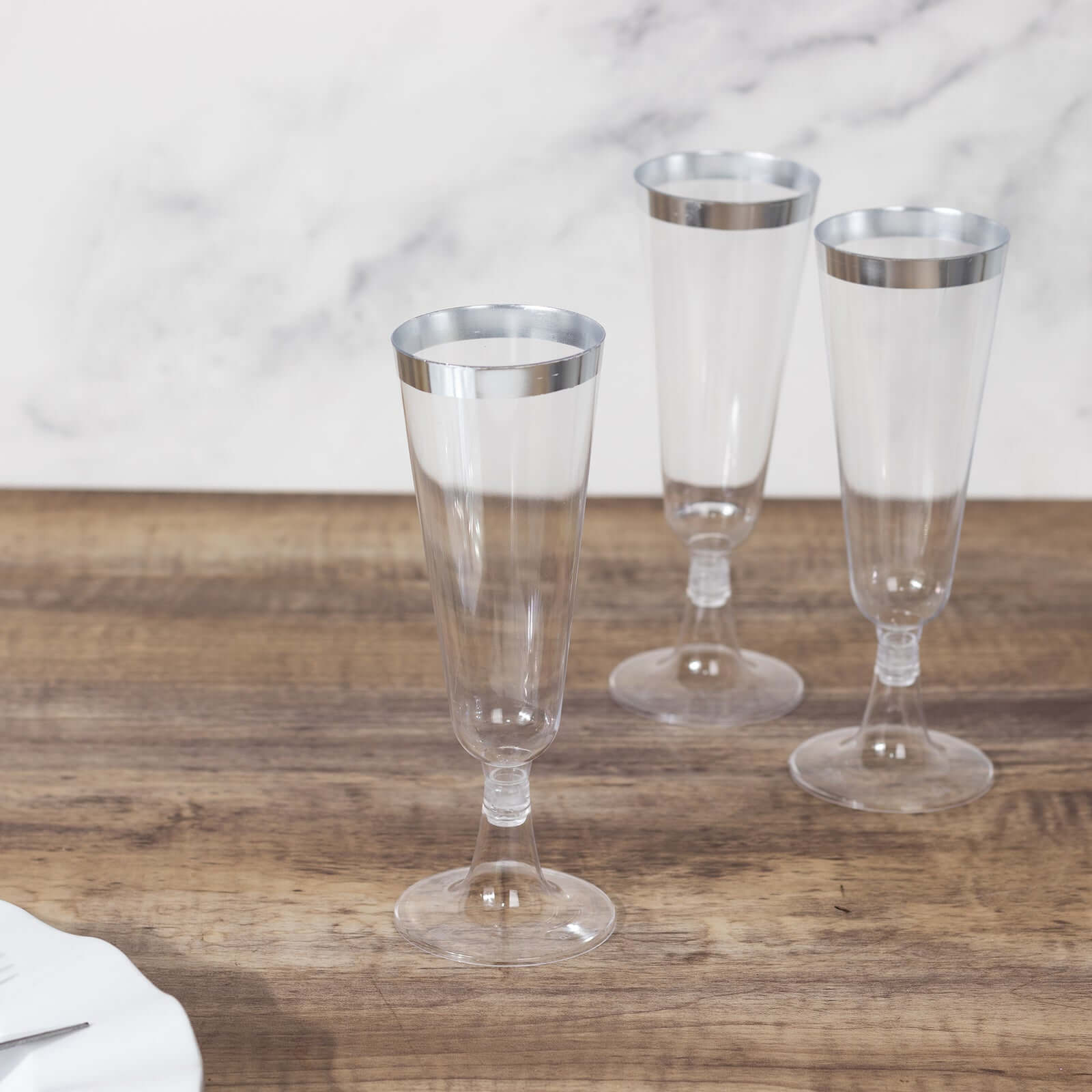 12-Pack Plastic Champagne Flutes Clear with Silver Rim - Stylish Disposable Cocktail Glasses for Parties 5oz 6"
