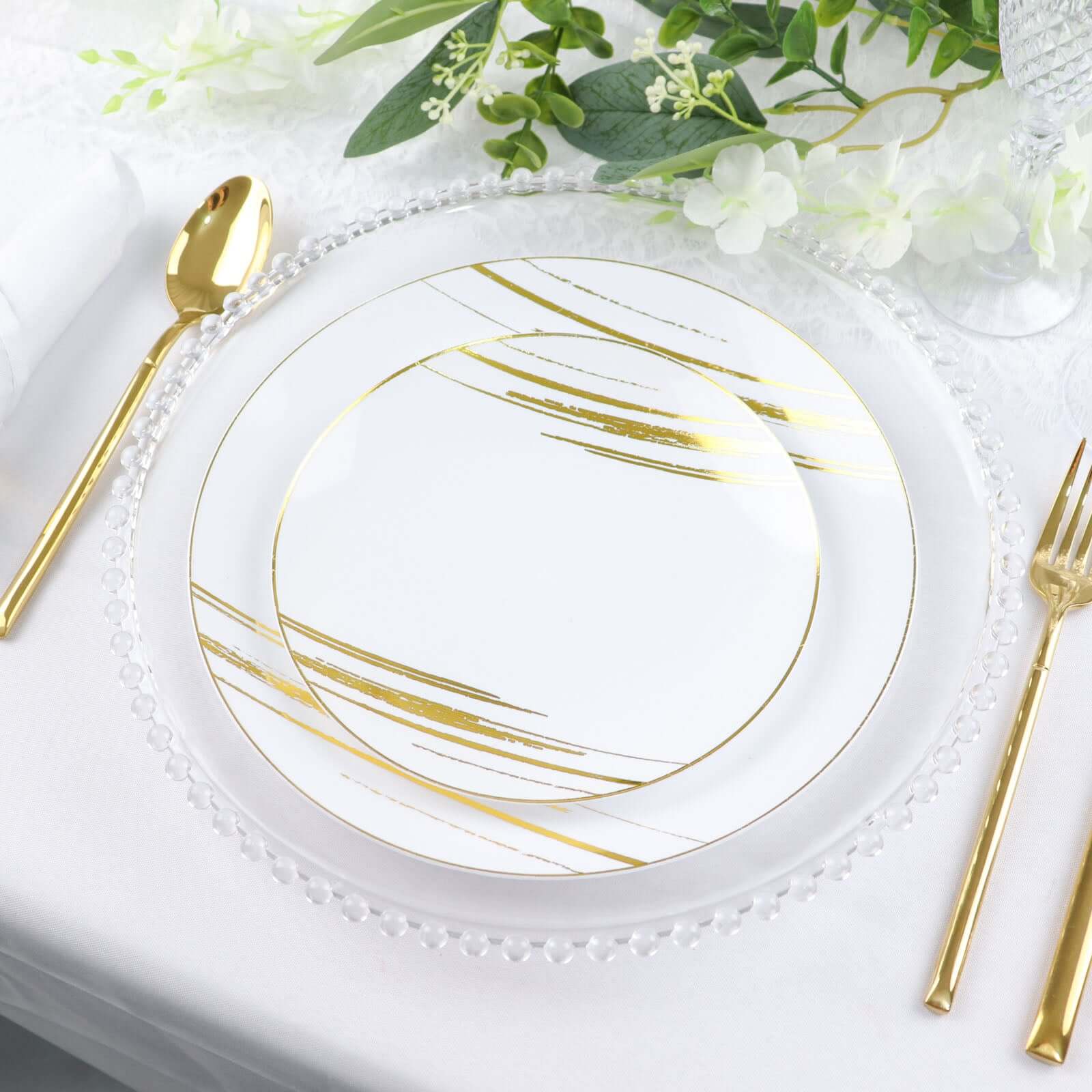 10-Pack Plastic 10" Round Dinner Plates in White with Gold Brush Stroked Print - Disposable Party Dinnerware for Modern Themed Events & Banquets