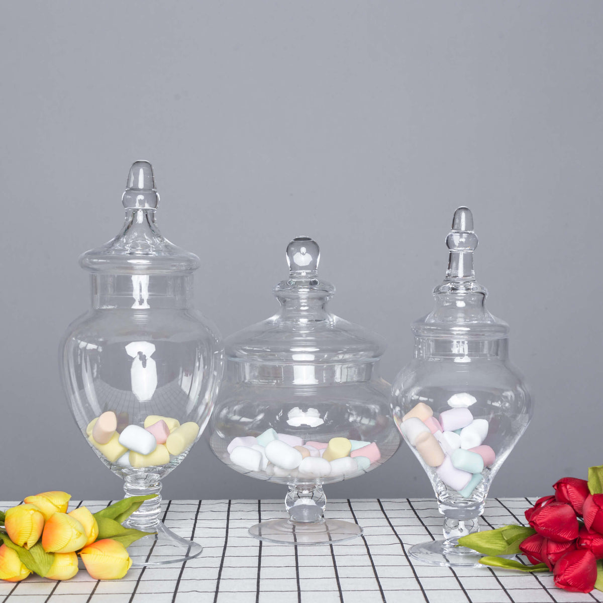 Set of 3 Glass Candy Jars Pedestal Apothecary Design Clear with Snap-On Lids - Stylish Party Favor Containers 10"/12"/14"